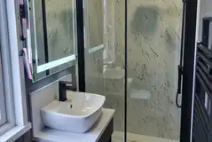 S-pod modern ensuite bathroom