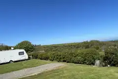 Grass and hardstanding pitches (optional 10 amp electric)