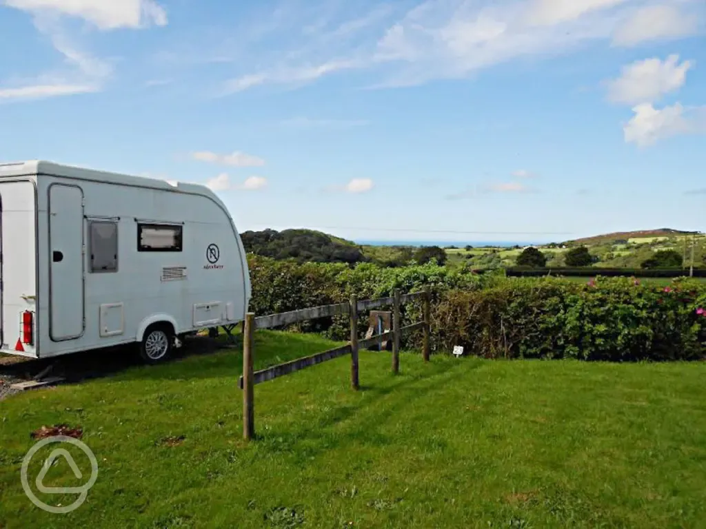 Grass pitches (optional electric) with countryside views