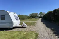 Grass and hardstanding pitches (optional 10 amp electric)