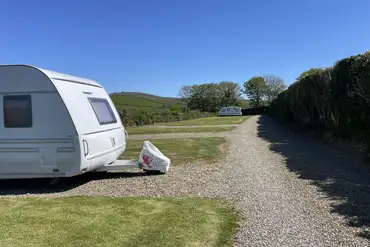 Grass and hardstanding pitches (optional 10 amp electric)