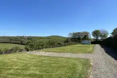 Grass and hardstanding pitches (optional 10 amp electric)