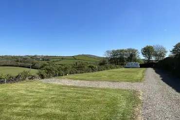 Grass and hardstanding pitches (optional 10 amp electric)