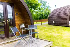 Camping pod decking and chairs Camping pod decking and chairs