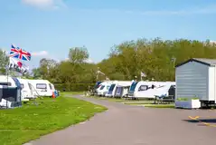 Electric hardstanding pitches (4.6m x 4.6m) in the Grove Field