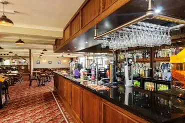 Pitch and Putt Inn bar at North Shore Holiday Park