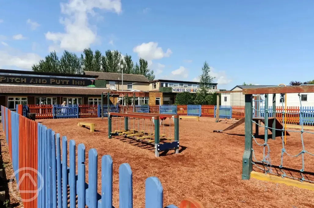 Pitch and Putt Inn outdoor seating and play area 