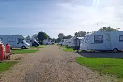 Tourers on electric hardstanding pitches Tourers on electric hardstanding pitches