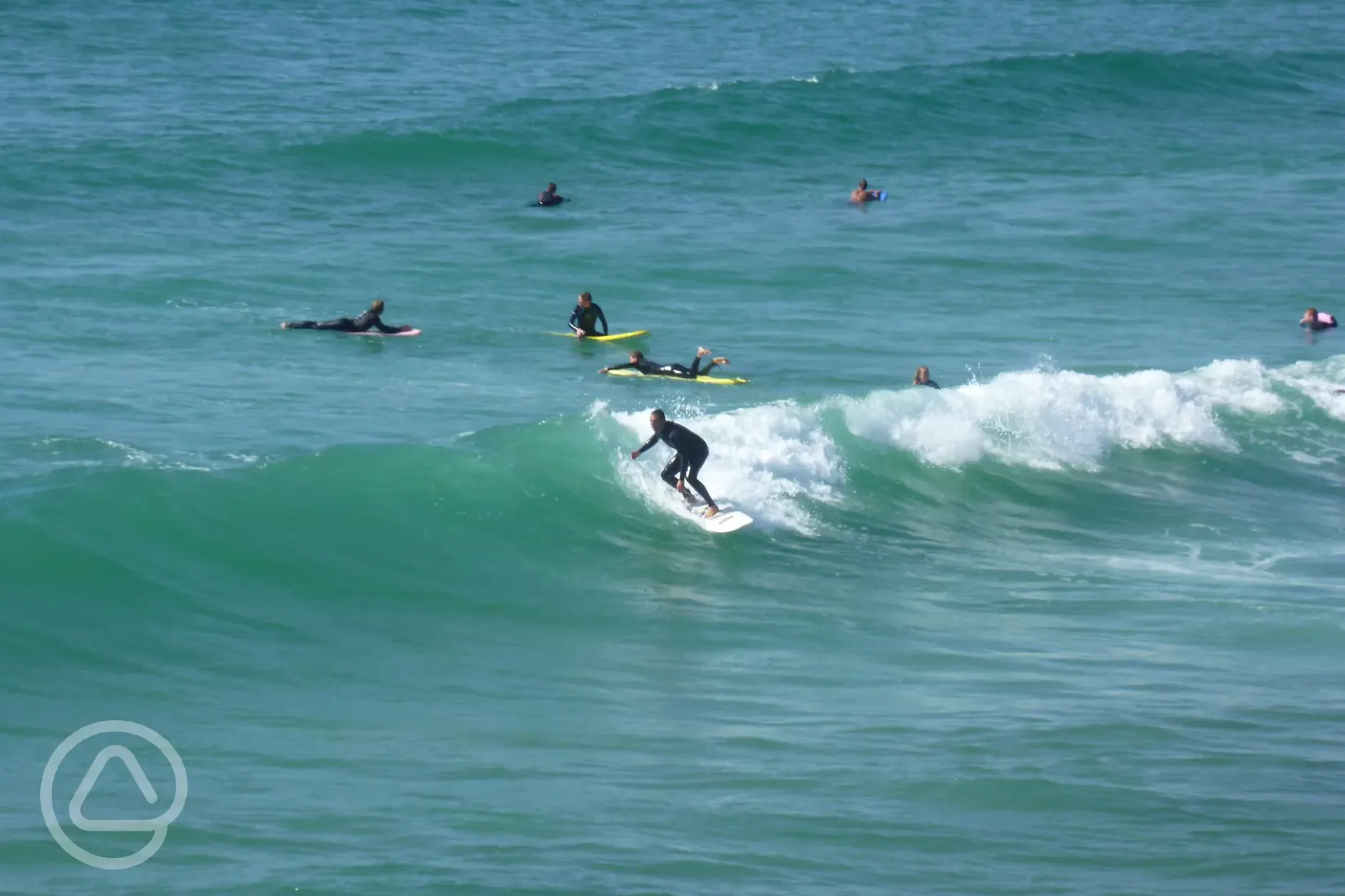 Surfing at Polzeath Beach