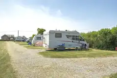 Hardstanding fully serviced pitches with 16 amp electric, water and grey waste