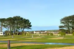 Electric hardstanding (5m x 8.5m) pitches with 16 amp hook ups Electric hardstanding (5m x 8.5m) pitches with 16 amp hook ups