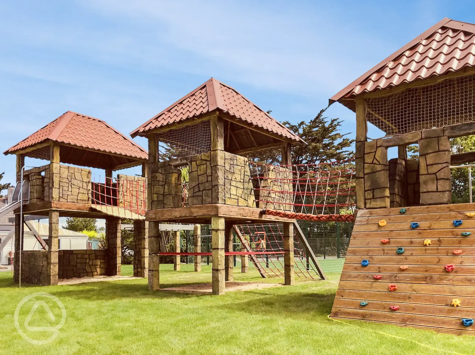 Play park with climbing frame