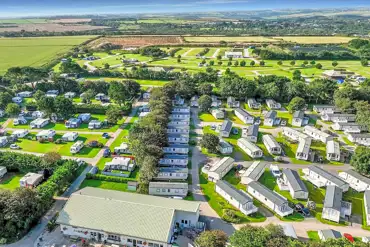 Aerial of Monkey Tree Holiday Park, with static caravans and touring pitches