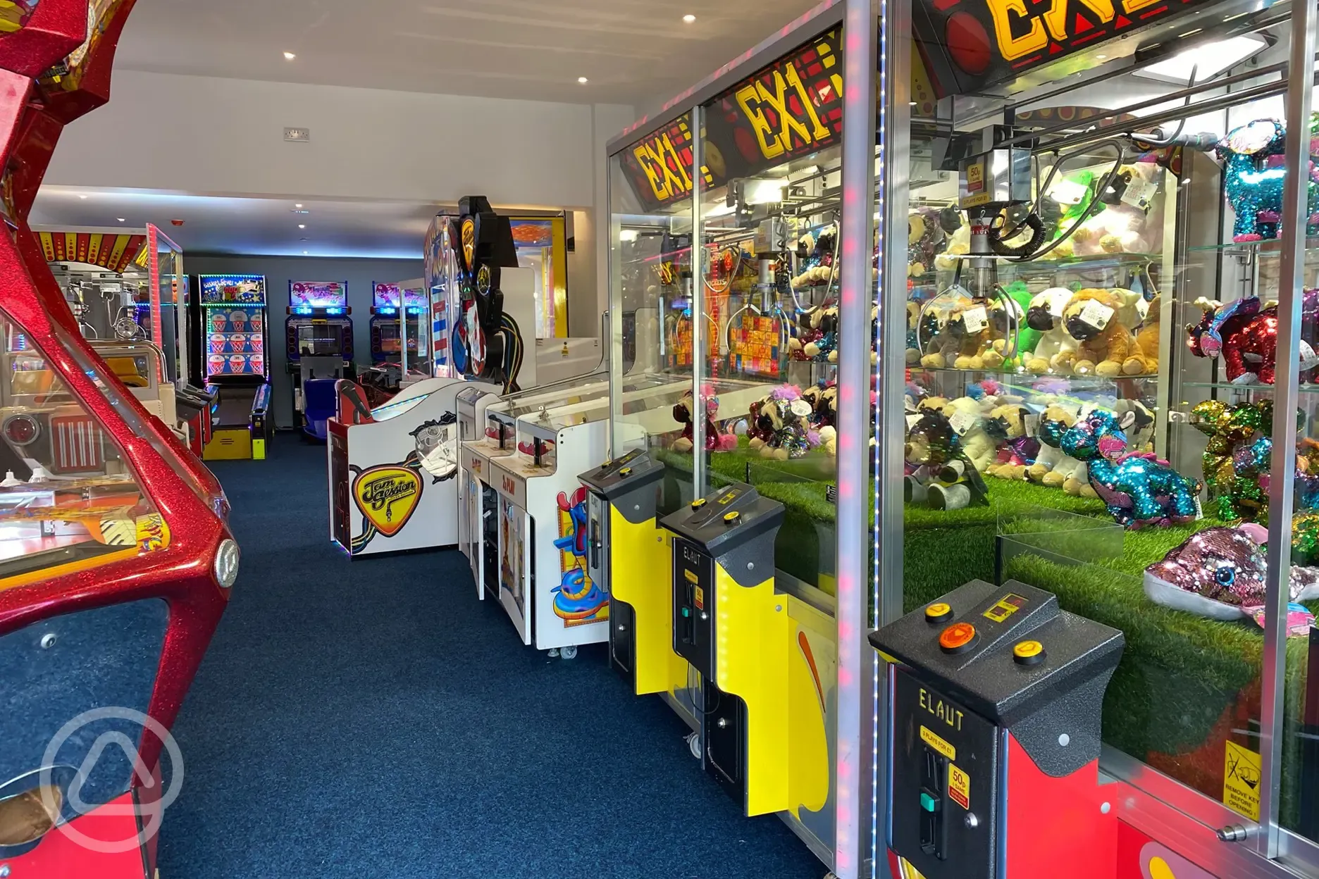 Arcade with claw cranes and interactive games