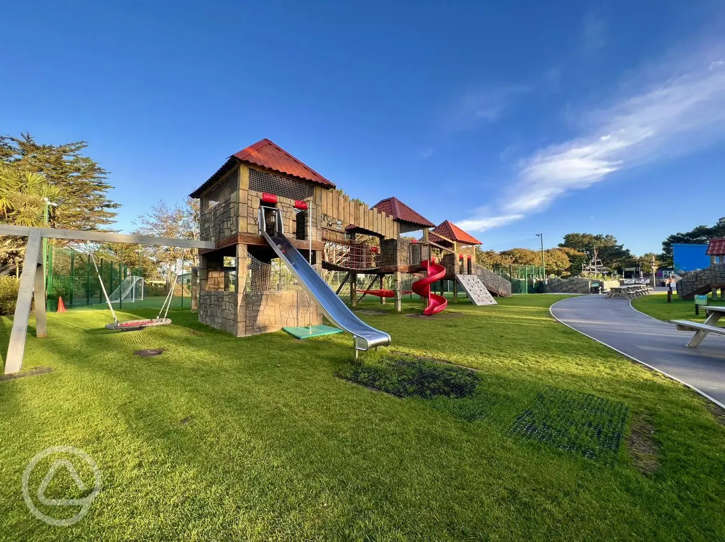 Play park with climbing frame, slide and swing