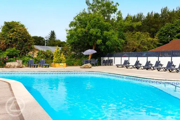 Heated outdoor swimming pool at Cornish Meadows Holiday Park