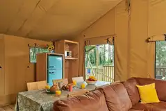 Safari tent lounge, dining and kitchen area