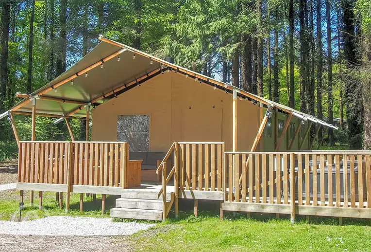 Safari tent with a large outdoor deck