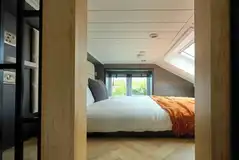 Glamping S-pod double mezzanine level with skylight (bedding provided)