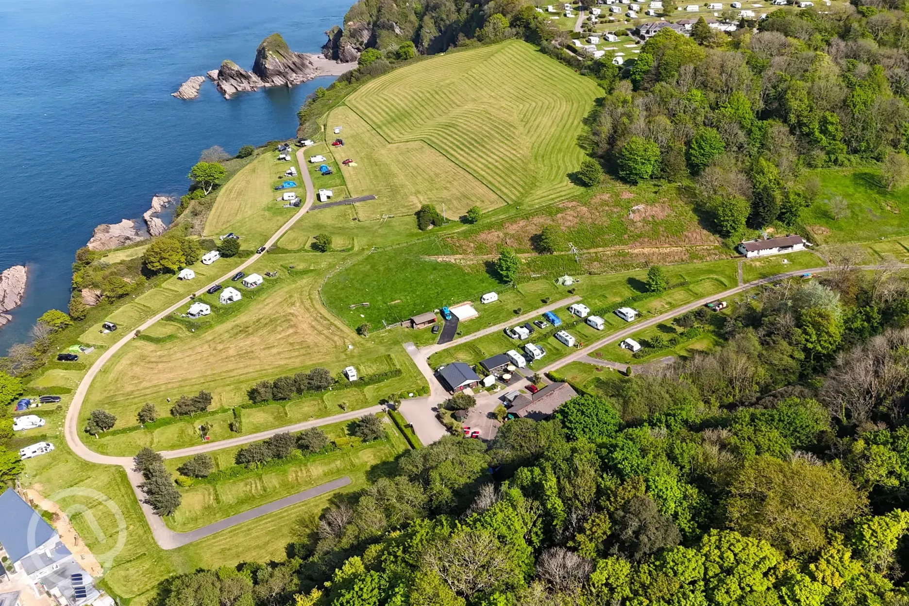 Bird's eye view of Watermouth Valley Camping Park and the coast