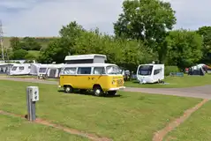 Electric grass touring pitches (10m x 9m) with 16 amp hook ups