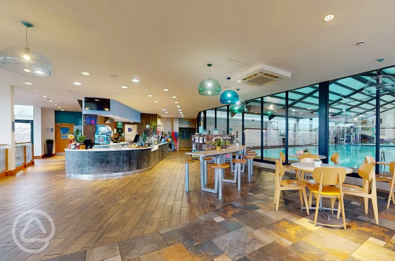 Indoor leisure lounge with views of the swimming pool