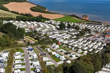 Aerial of Ladram Bay Holiday Park overlooking private beach