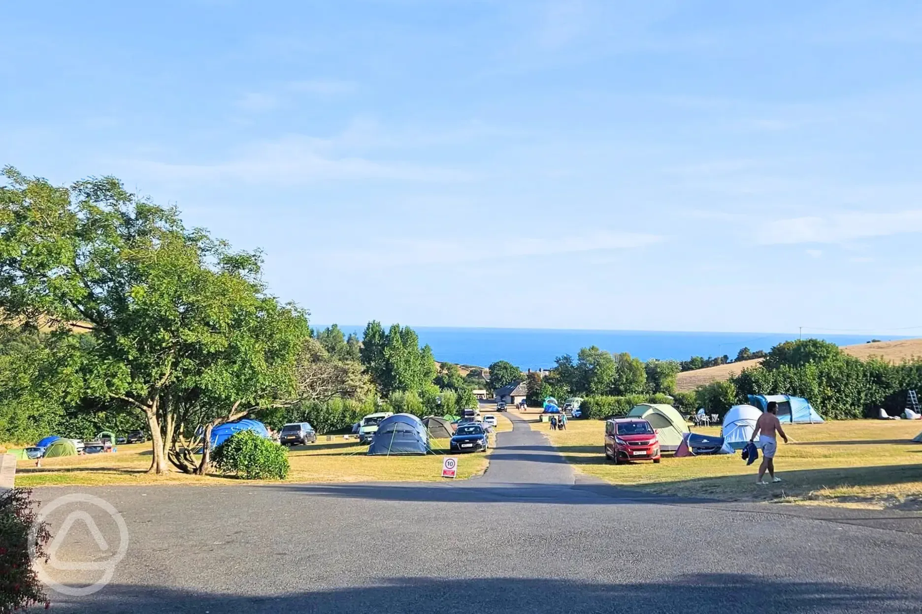 Non electric grass pitches with sea views over Weymouth Bay