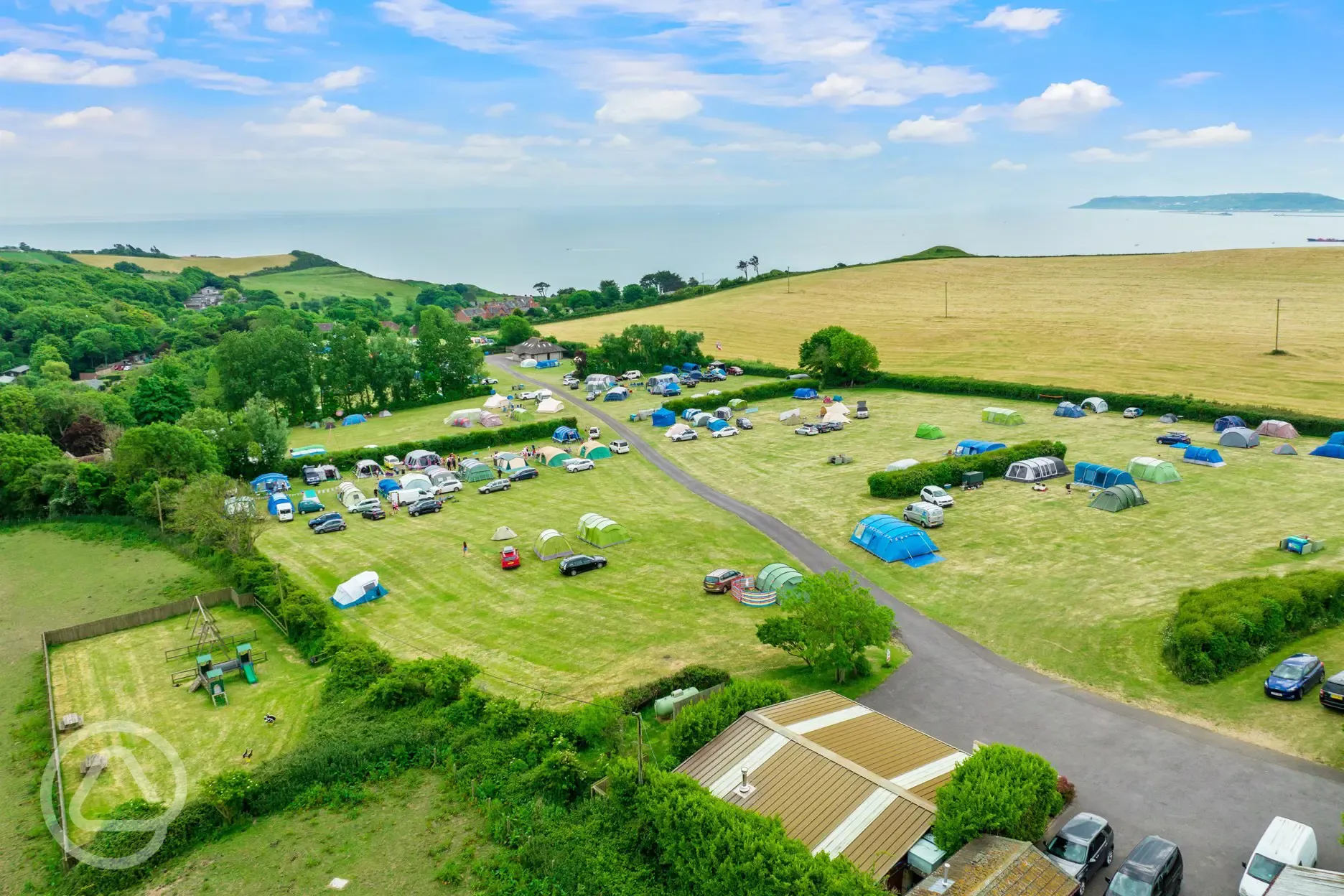 Aerial view of non electric grass pitches and play area