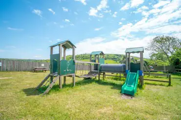 Play area at Rosewall Camping with slide