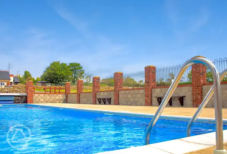 Outdoor heated swimming pool at West Fleet Holiday Farm (open during summer)