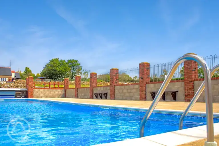 Outdoor heated swimming pool at West Fleet Holiday Farm (open during summer)