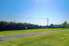 Electric grass campervan pitches at West Fleet Holiday Farm