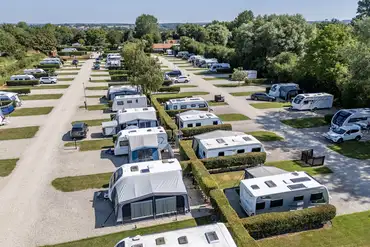 Hardstanding pitches with dividing hedges at Black Bull Caravan Park