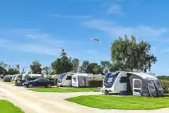 XL super serviced electric pitches at Black Bull Caravan Park (awnings allowed)