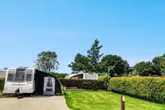 XL super serviced pitch with a private grass area and awning space XL super serviced pitch with a private grass area and awning space