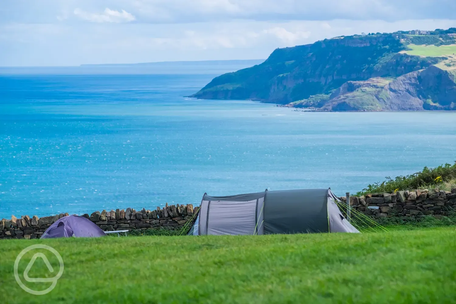 Non electric grass pitches with sea views