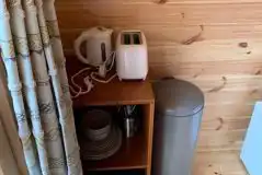 Small pod kitchen appliances, including toaster, kettle and crockery