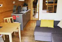 Deluxe Mega Pod with a double bed, double sofa bed, and single bunk bed Deluxe Mega Pod with a double bed, double sofa bed, and single bunk bed