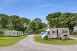 Electric grass touring pitches at Llys Derwen Caravan and Campsite