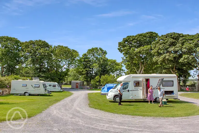 Electric grass touring pitches at Llys Derwen Caravan and Campsite