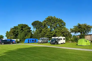 Electric grass pitches with a 16 amp electric hook up at Twll Y Clawdd