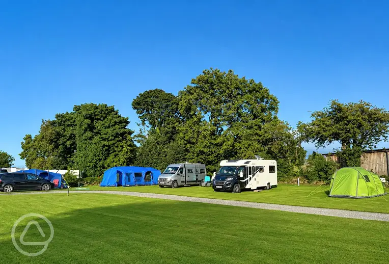 Electric grass pitches with a 16 amp electric hook up at Twll Y Clawdd