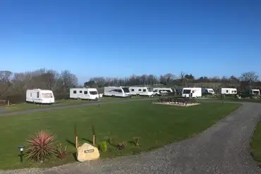 Electric grass pitches with a communal picnic area