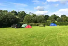 Non electric grass pitches, some ground is slightly sloping Non electric grass pitches, some ground is slightly sloping