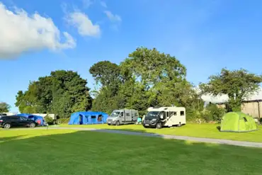 Electric grass pitches with a 16 amp electric hook up at Twll Y Clawdd