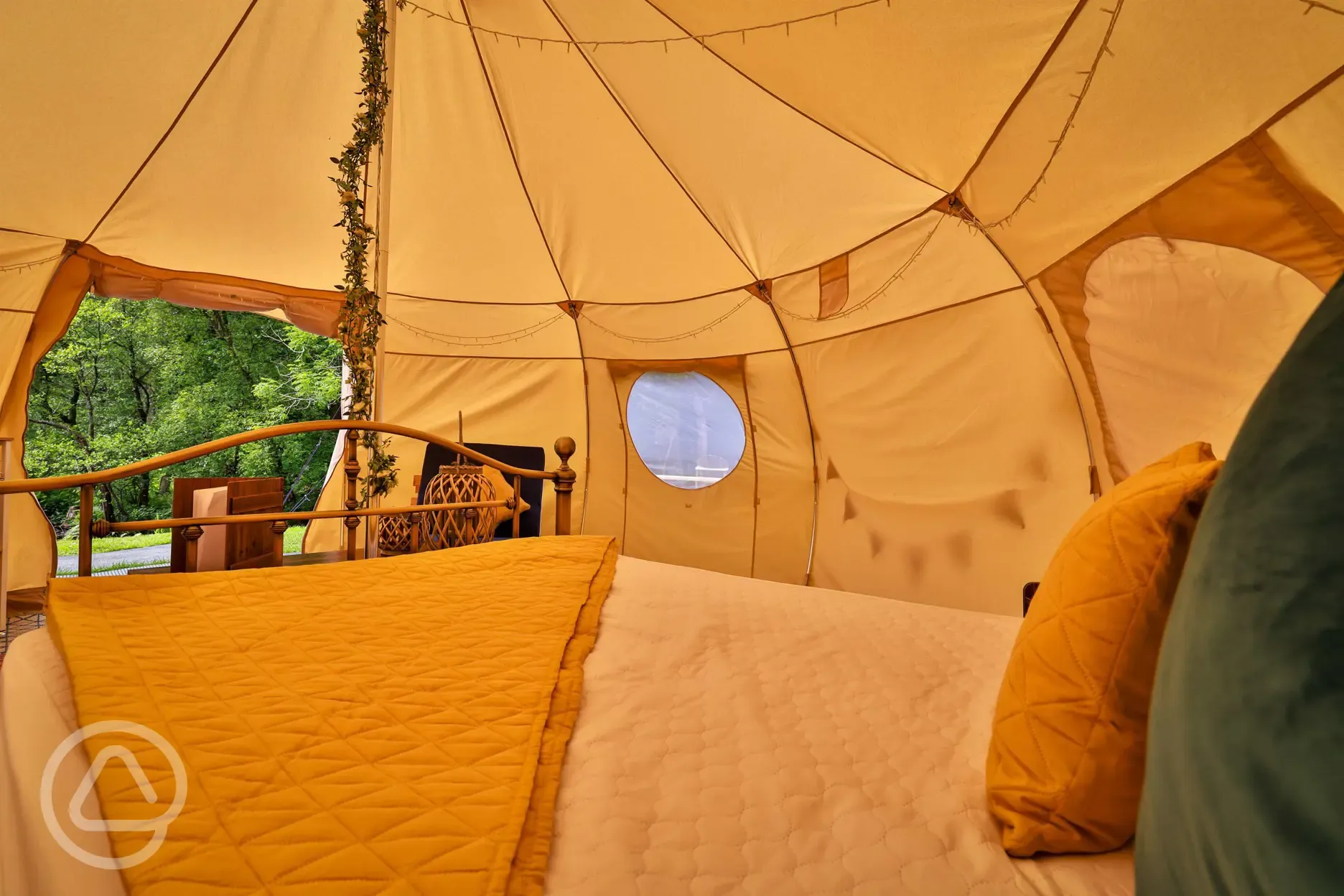 Bell tent interior with cosy furnishings Bell tent interior with cosy furnishings