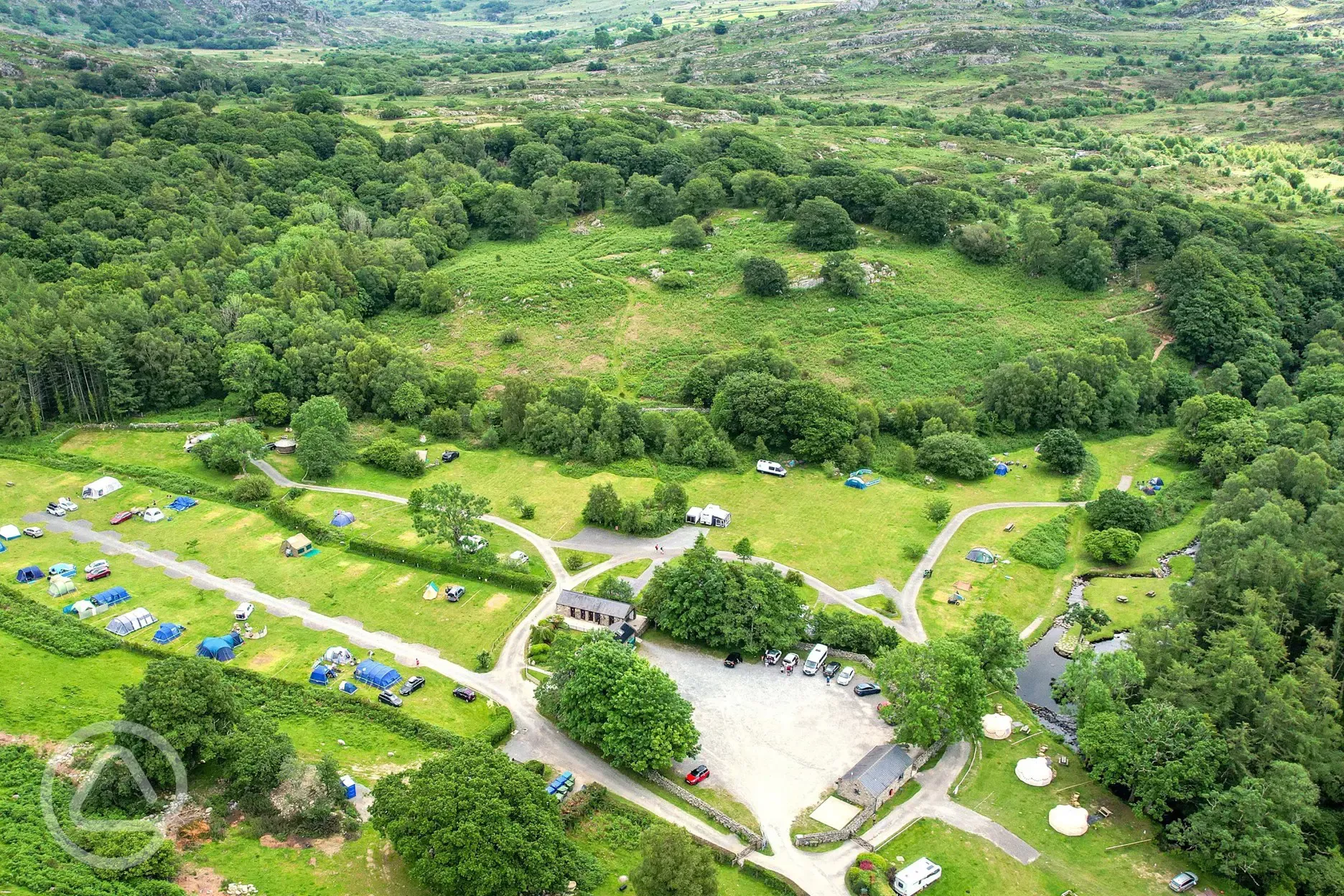 Aerial of Nantcol Waterfalls surrounded by countryside Aerial of Nantcol Waterfalls surrounded by countryside