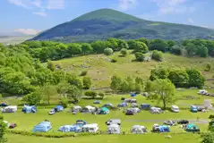 Nantcol Waterfalls grass camping pitches with mountain views Nantcol Waterfalls grass camping pitches with mountain views