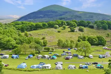 Nantcol Waterfalls grass camping pitches with mountain views